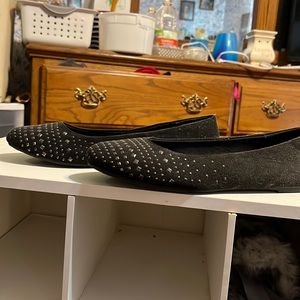 Black studded flats.